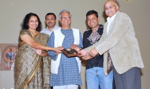 Members of Pujari with Dr. Muhammad Yunus at IACA